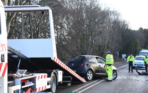 A recovery vehicle pictured removing the damaged Vauxhall Corsa on South Deeside Road.

Picture by Paul Glendell.