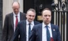 Health Secretary Matt Hancock (right), and Chief Medical Officer Chris Whitty (left) leaving the Cabinet Office in London, after a meeting of the Government's emergency committee Cobra to discuss coronavirus.