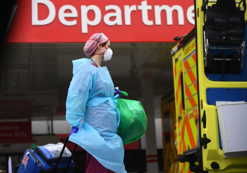 The NHS system has been described as "eerily quiet" but Dr Gregor Smith is urging people to still present with symptoms.