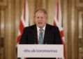 Prime Minister Boris Johnson speaking at a media briefing in Downing Street,