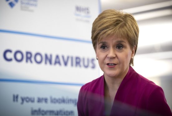 First Minister Nicola Sturgeon speaking during a visit to the NHS 24 contact centre at the Golden Jubilee National Hospital in Glasgow to meet staff supporting Scotland's public information response to coronavirus (COVID-19).