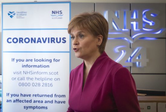 First Minister Nicola Sturgeon speaking during a visit to the NHS 24 contact centre at the Golden Jubilee National Hospital in Glasgow to meet staff supporting Scotland's public information response to coronavirus (COVID-19).