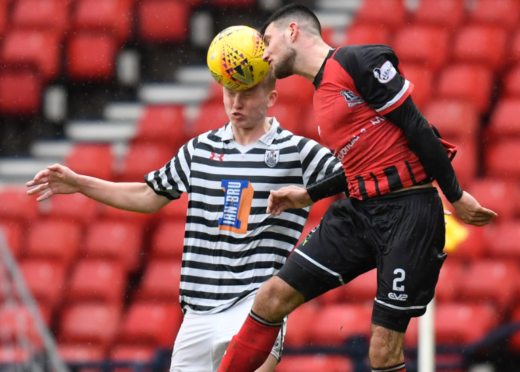 Elgin's Matty Cooper in action.