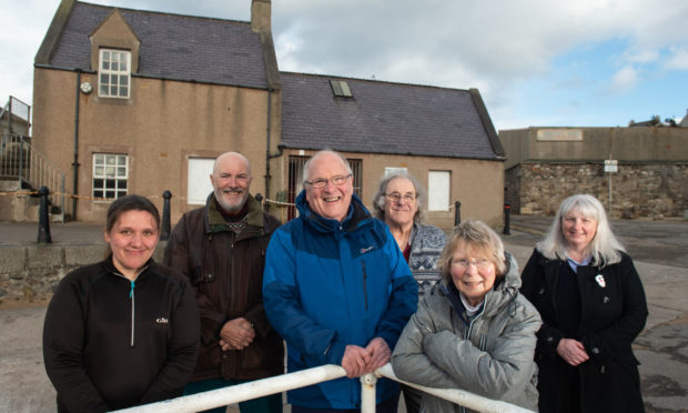 L2R - Angela Hunter (sailing instructor), Malcolm Watt (trustee of THA), Ashley Mowat (chairman), Bert Reid (boat builder and trustee), Rosie Pye (secretary) and Melanie Newton (administration)
Pictures by JASON HEDGES