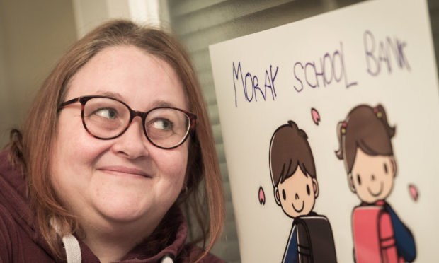 Debi Weir, chairwoman of Moray School Bank at the shop in Rothes. Picture by Jason Hedges.