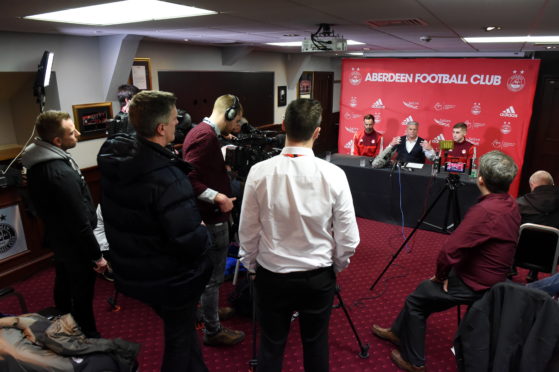 Aberdeen chairman Dave Cormack, club captain Joe Lewis and midfielder Dean Campbell at the launch of the club's new season-ticket initiative.
Picture by Kenny Elrick