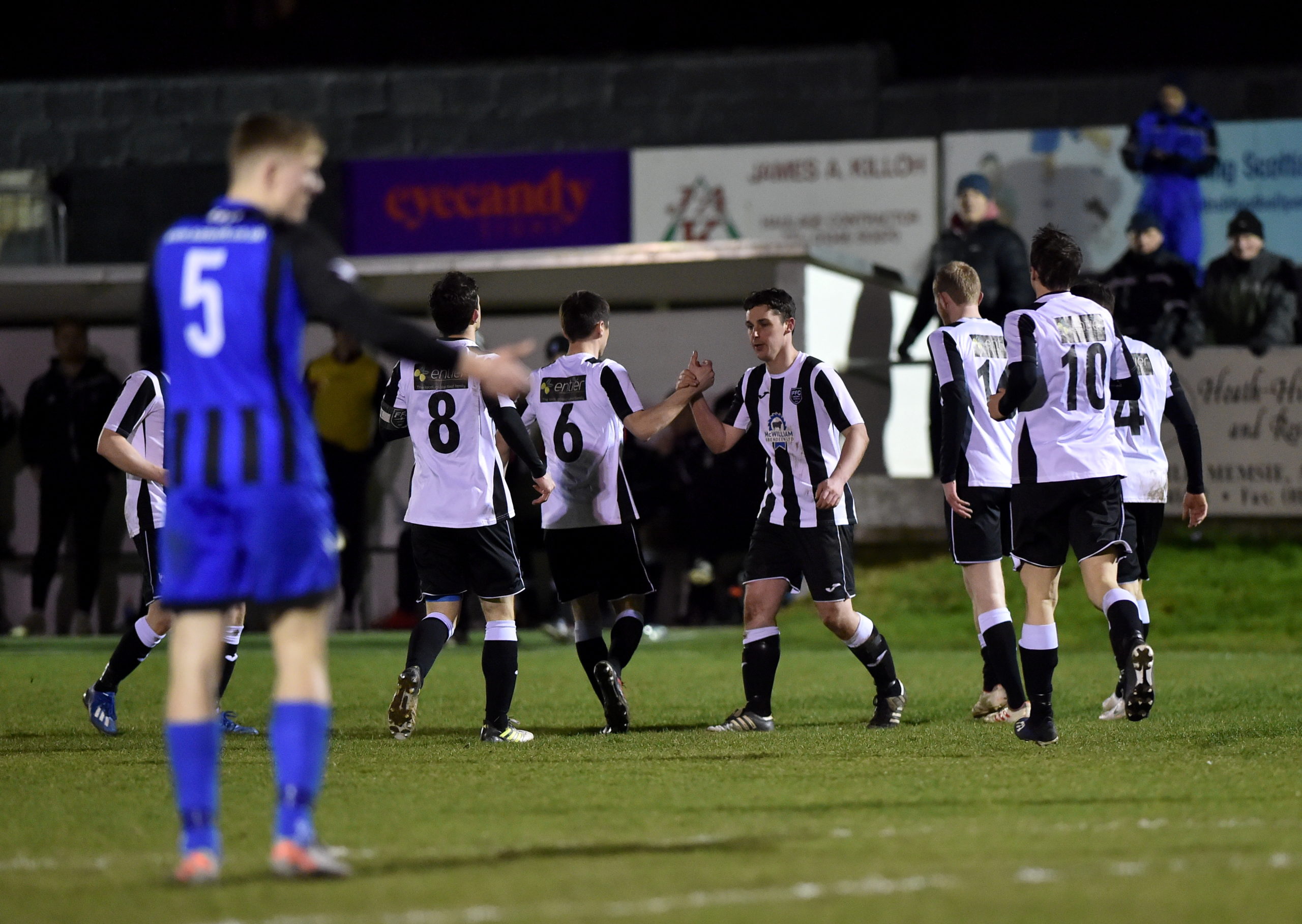 Grant Campbell celebrates his goal with team-mates.
Picture by Scott Baxter