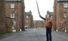 John Ormiston with his thirteenth century war sword reportedly recovered in 1876 from the site of the Battle of Stirling Bridge in Stirling when Wallace defeated the English.
Picture by Sandy McCook