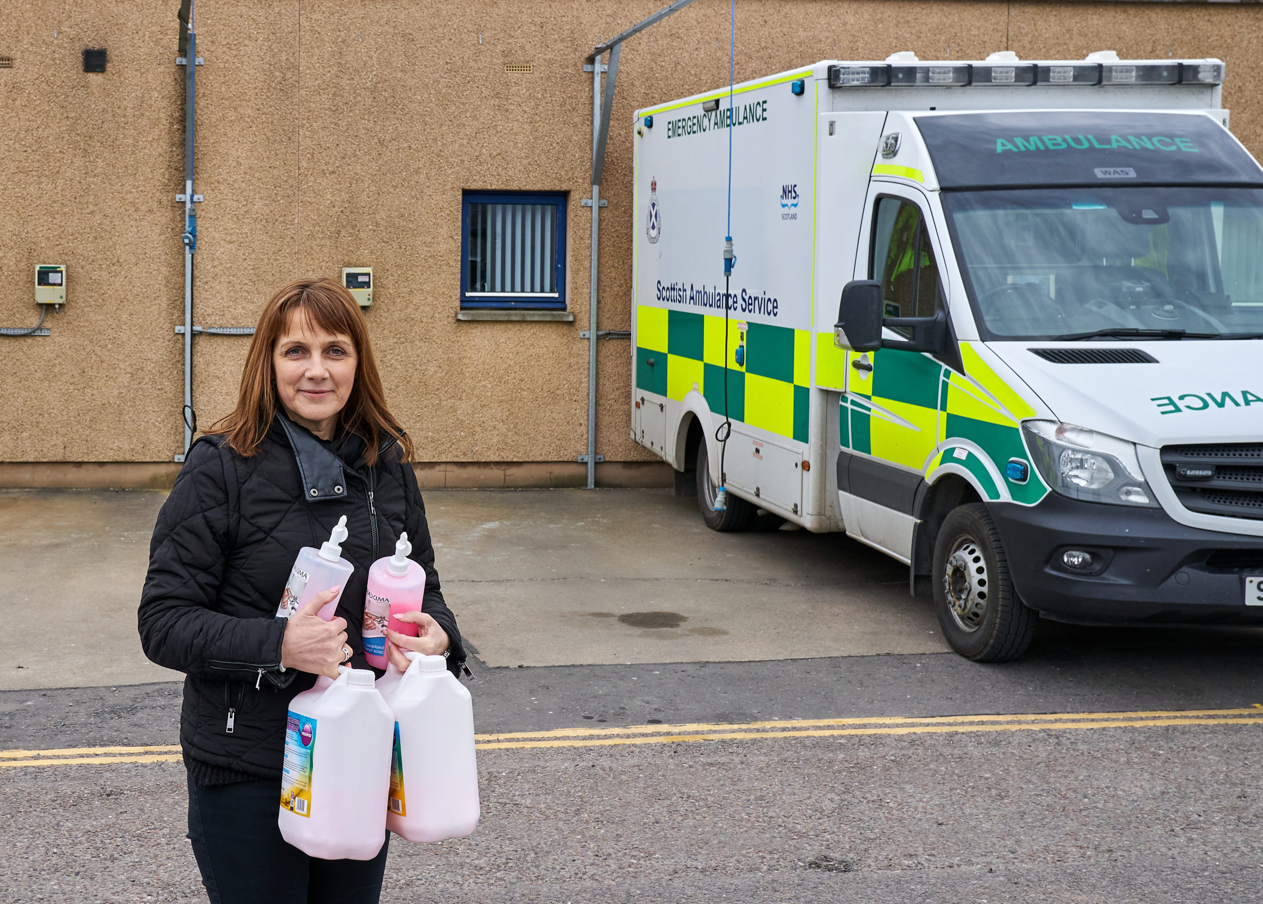 Irma Westwood, Deputy Head of Bishopmill Primary School, Elgin delivering the supplies of soap and towels.