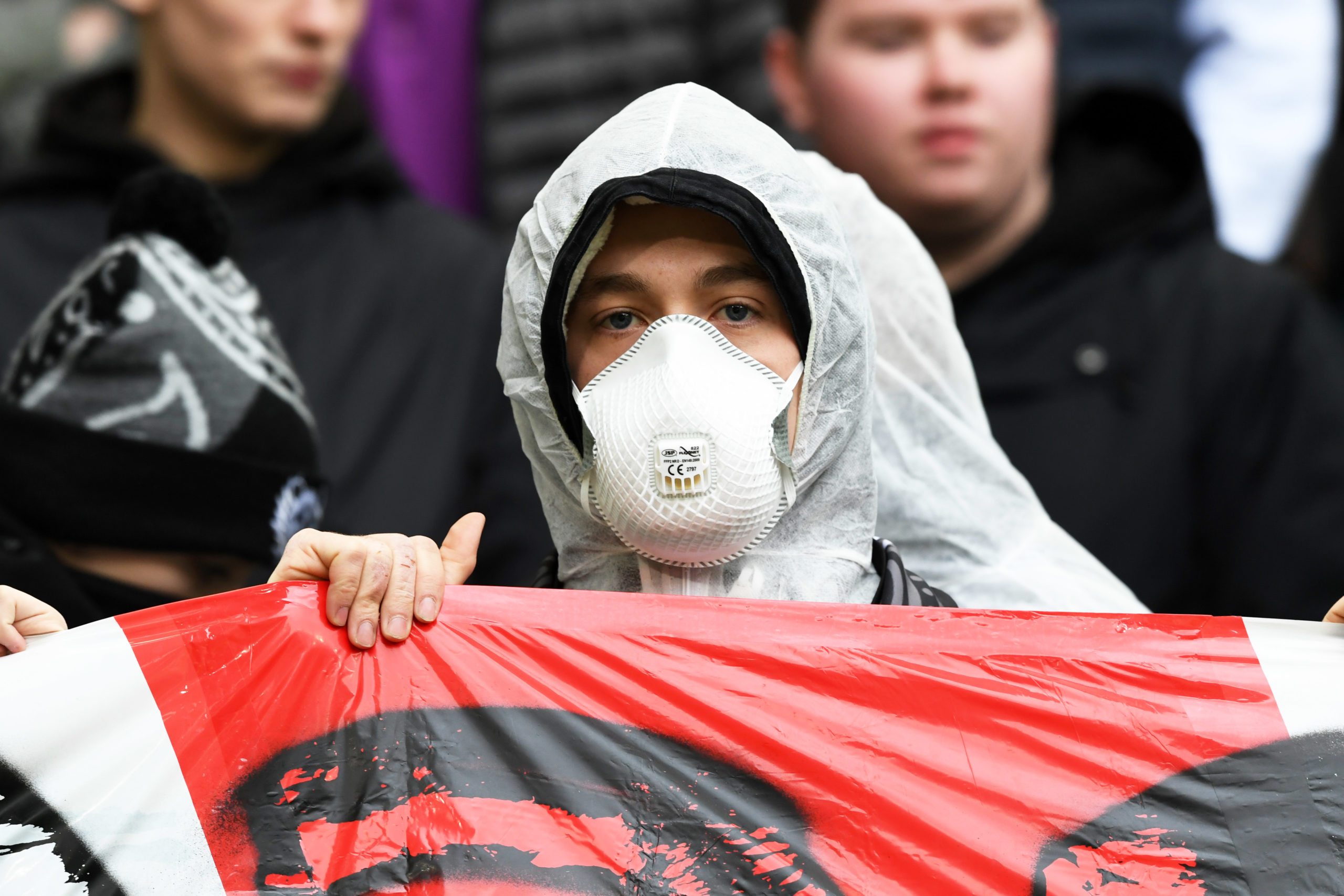 A football fan with a face mask during the Ladbrokes Premiership match between Celtic and St Mirren at Celtic Park on March 7 as coronavirus concerns increased.