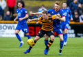 Alloa's Alan Trouten and David Carson in action during the Ladbrokes Championship match between Alloa and Inverness CT.
