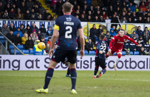 Ryan Kent strikes to make it 1-0 to Rangers.