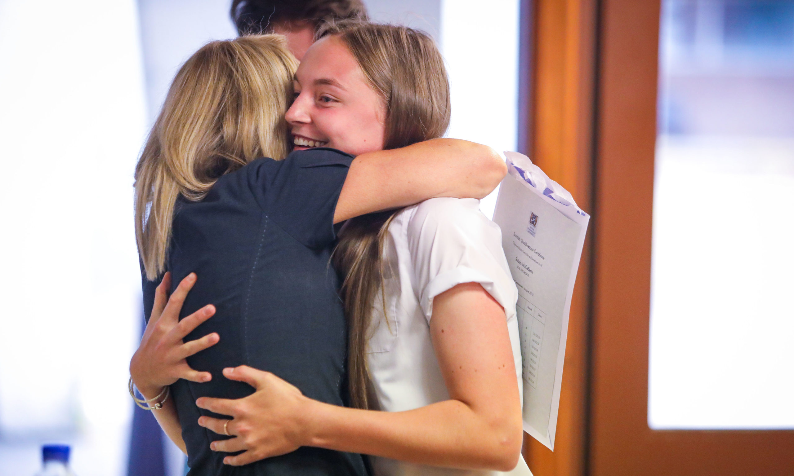 More than 136,000 candidates completed SQA exams, courses and awards last year. Robyn McCafferty, at Woodmill High School, Dunfermline got a congratulatory hug from her mum after receiving her results.
