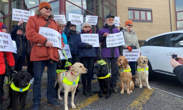 Campaigners gathered yesterday in a bid to save the charity