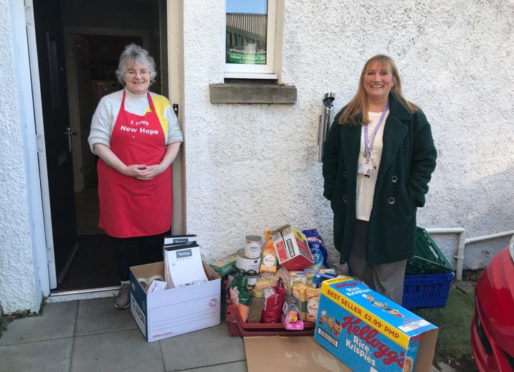 Theresa Bain delivering parcels to the Hope Kitchen.