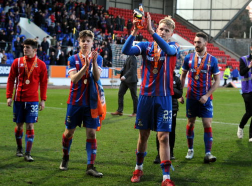 Daniel MacKay celebrates the Challenge Cup win with Coll Donaldson.