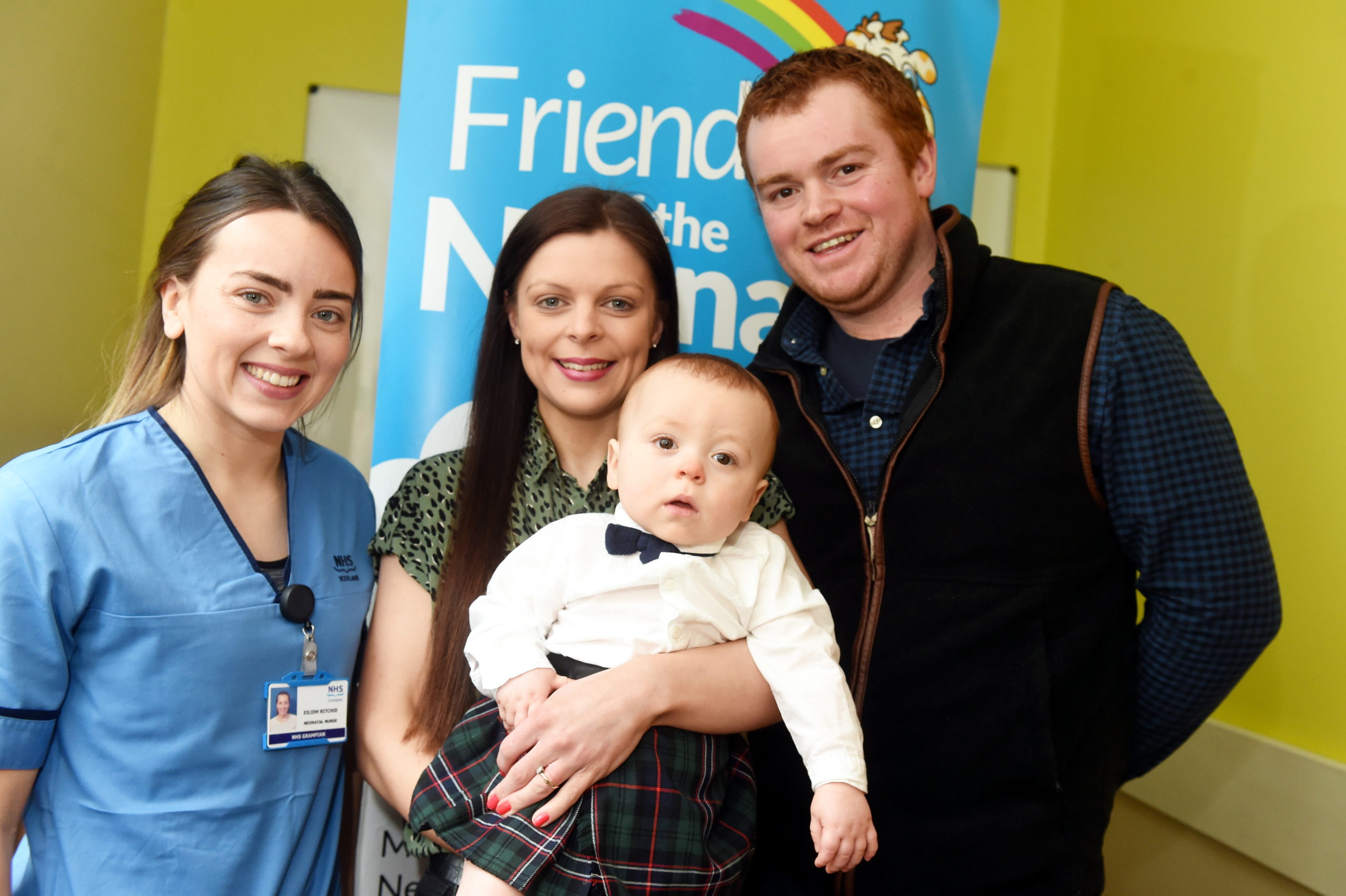 CR0020009 Alford mum Sarah Lawson meets with neonatal  nurse, Eilidh Ritchie who helped deliver her baby Harry. In the picture are from left: neonatal  nurse, Eilidh Ritchie, Mum, Sarah Lawson, baby Harry Smart and dad, Callum Smart at Maternity hospital, Aberdeen.