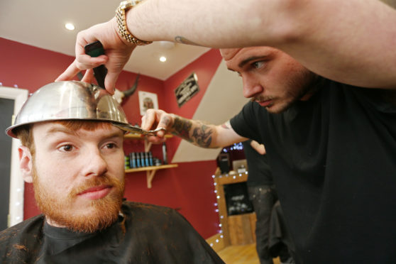 Photo by Joe Pepler/Shutterstock (4681781u)
Customer gets the summer must-have style at Headcase Barbers
Dumb and Dumber To - Bowl Cut Haircuts shoot, Richmond, London, Britain - 21 Apr 2015
Eager guys braved the 'bowl cut' trend, inspired by Jim Carey's character Lloyd Christmas in Dumb & Dumber To. Headcase Barbers has tipped the style as a must-have look for summer 2015. Dumb and Dumber To is out on Blu-ray and DVD now.