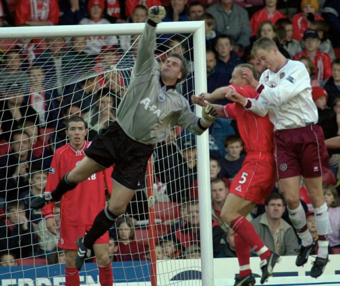 Peter Kjaer commands his box during his Pittodrie debut against Hearts in 2001.