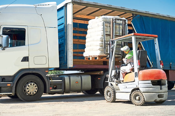 Farmers are being asked to keep a safe distance and provide hand sanitation for drivers delivering essential supplies.