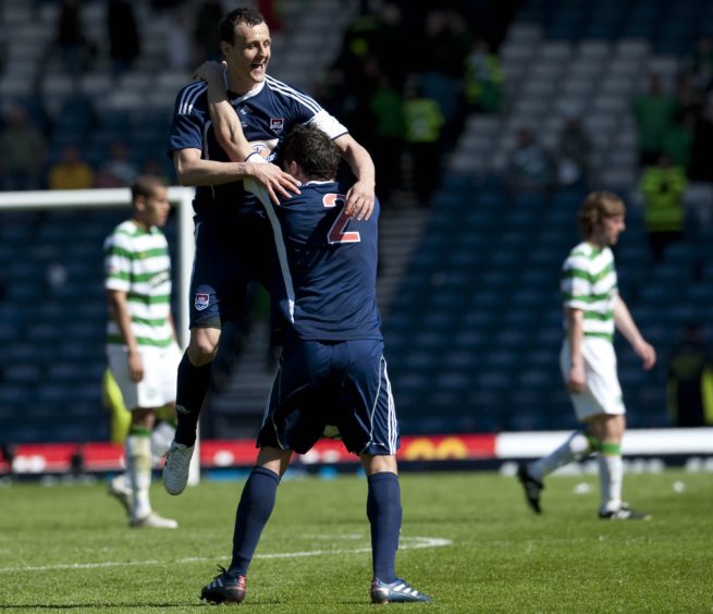 Ross County pair Alex Keddie (left) and Gary Miller celebrate at the final whistle