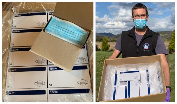 Scottish MRT national medial officer, Alastair Glennie, holds the PPE that was donated by Apple.