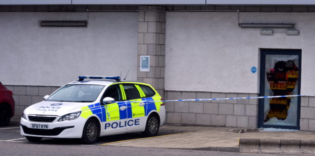 Police at Lidl supermarket on King Street. Picture by Chris Sumner.