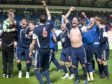 Ross County's players celebrate defeating Celtic in their Scottish Cup semi-final in 2010.