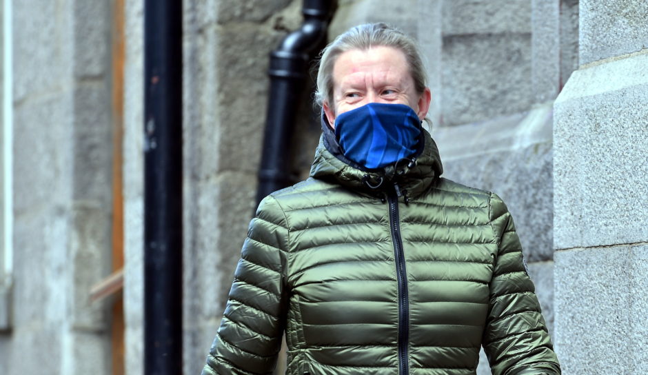 The Scottish Government is recommending wearing a face covering in "limited circumstances".