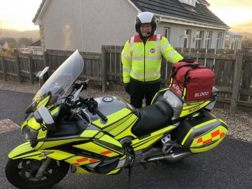 Blood bike rider Neil McLaughlin ready to begin his shift.