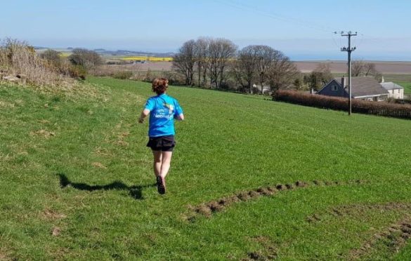 Kate Robertson completing her latest marathon.