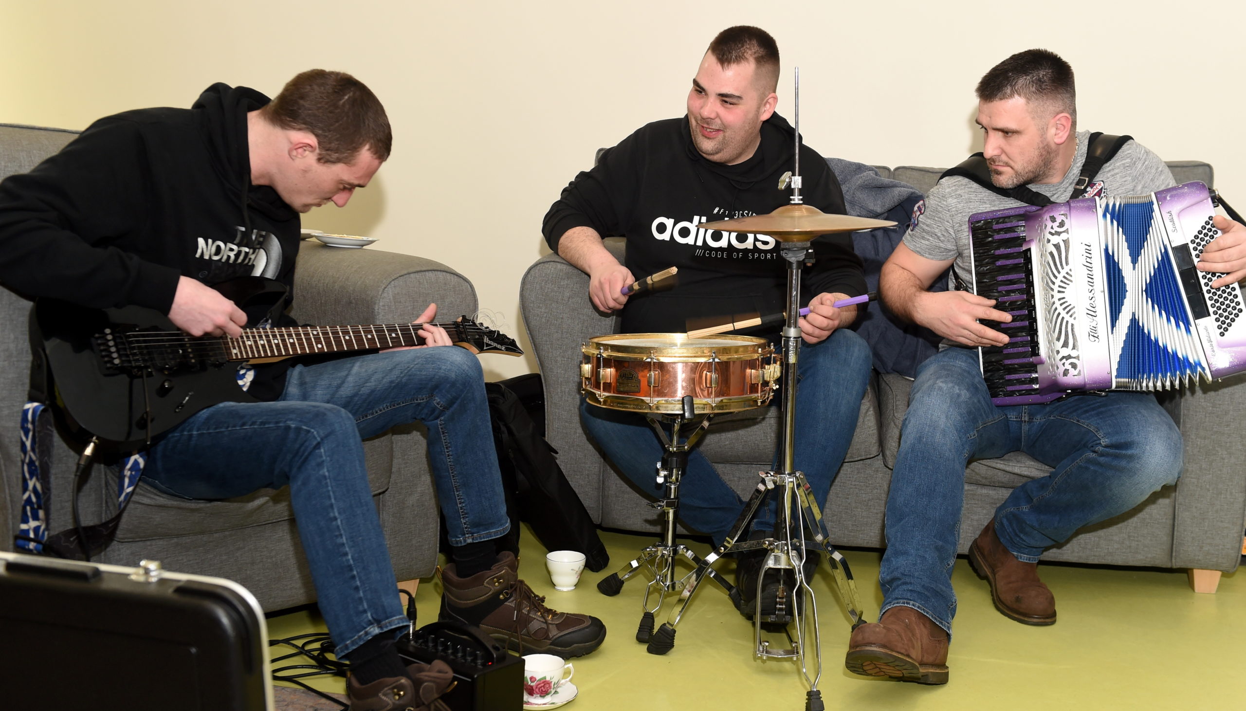 Peat and Diesel playing in the Highland Hospice in Inverness. Picture by Sandy McCook.