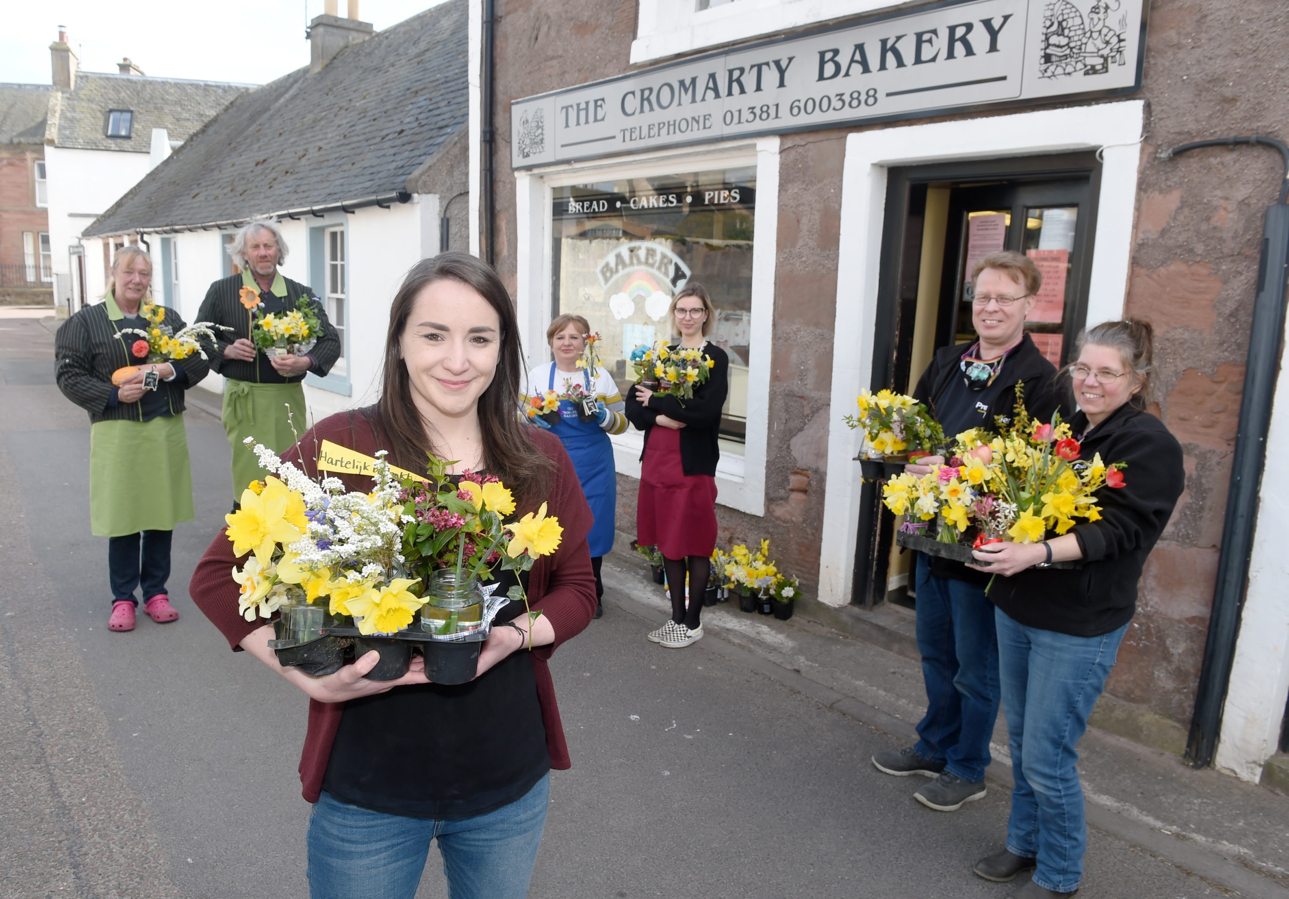 The owners of Cromarty Stores, The Cheese House and the Bakery were recipients of flowers and thanks from the community on Sunday night.
Picture by Sandy McCook.
