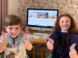 of Ella-Mae Hosie, 8, and Theo Hosie, 4, from Inverness, enjoying the Kids Zone activities on the website.