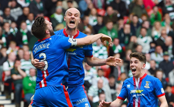 David Raven celebrates his goal against Celtic with Graeme Shinnie.