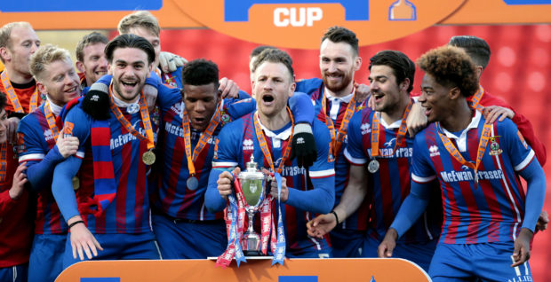 Gary Warren lifts the Irn-Bru Cup for Caley Thistle after defeating Dumbarton.