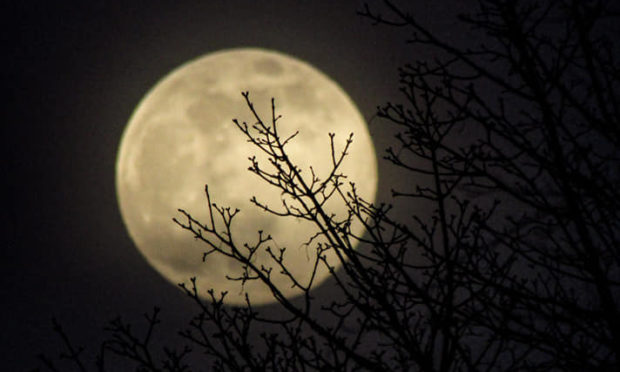 The moon in across Aberdeen.