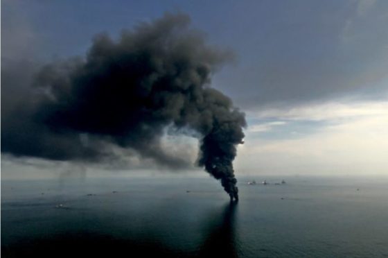Smoke billows from controlled oil burns near the site of the BP Plc Deepwater Horizon oil spill in the Gulf of Mexico off the coast of Louisiana on June 19, 2010. Photographer: Derick E. Hingle/Bloomberg
