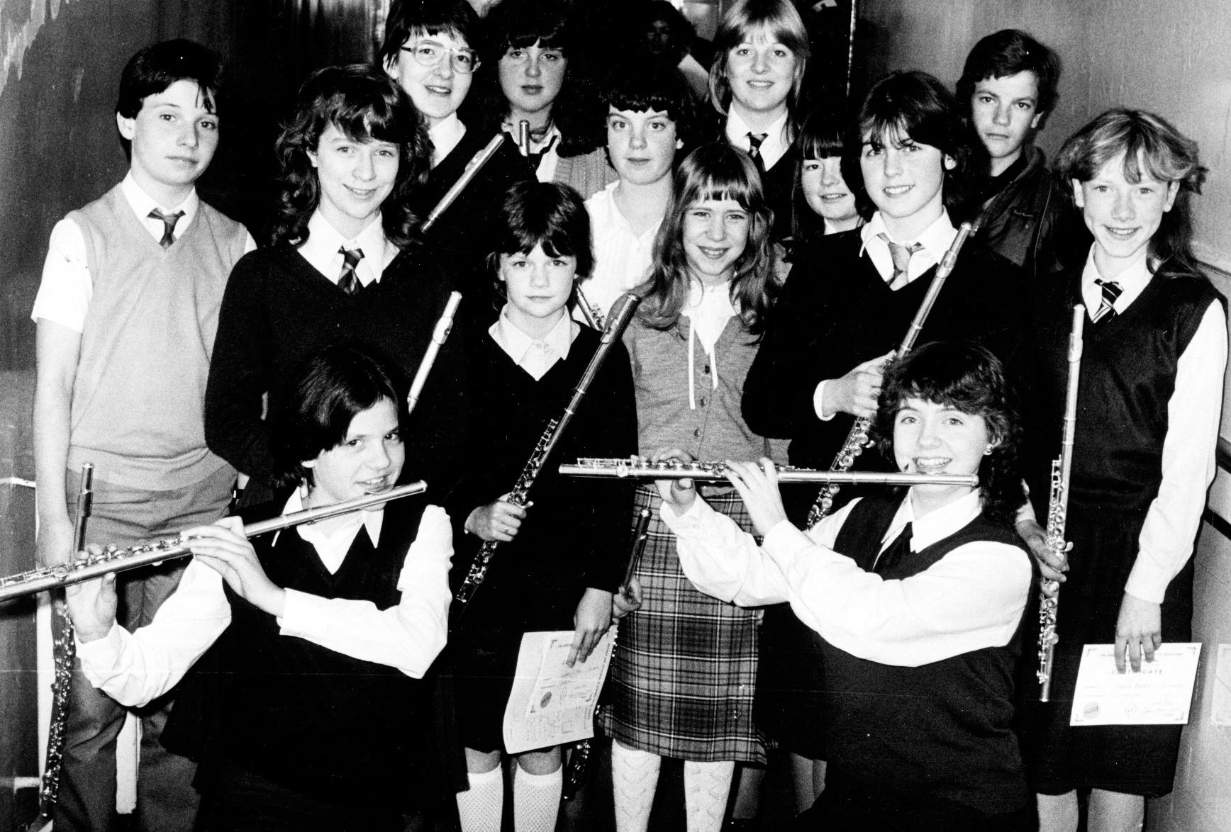 Angela Stone, front left, and Angela Young, joint winners of the 15-and-under flute section, with other participants of the 1983 Aberdeen and North East of Scotland Music Festival.