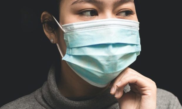 New guidance says care workers should be given face masks to protect themselves from the coronavirus.