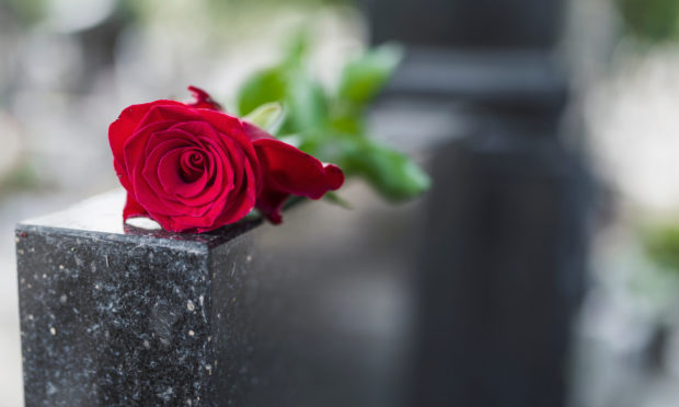 A funeral headstone grave