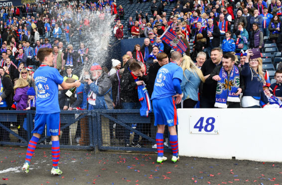 Inverness CT's Ryan Christie (left) and James Vincent celebrate with the fans