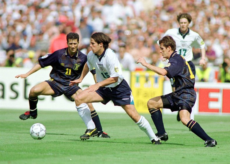 England substitute Jamie Redknapp takes control of possession in midfield.