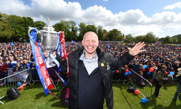 John Hughes with the Scottish Cup.