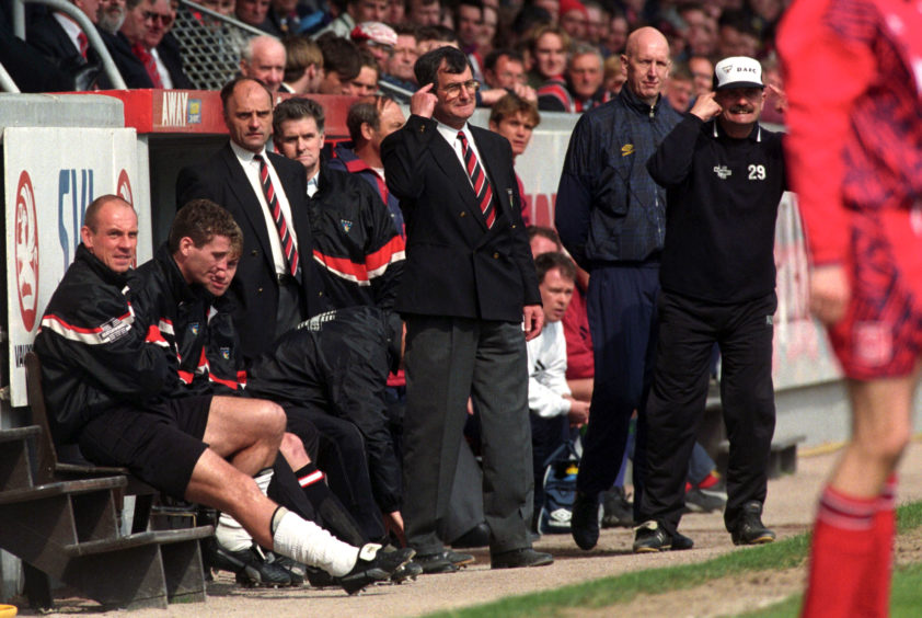 Dunfermine manager Bert Paton in the dugout.