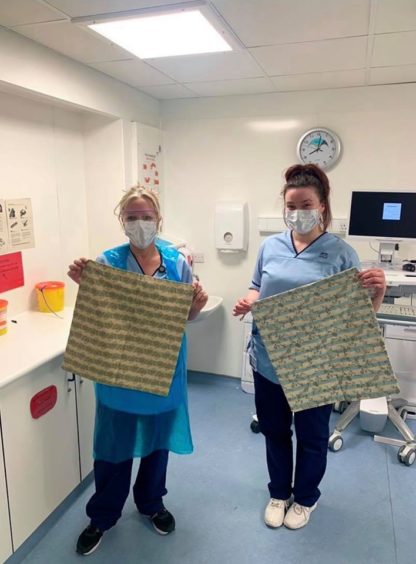 Staff with their scrub bags from the group