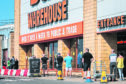 Big queues of customers queuing to get into the B&Q store in Parkhead, Glasgow.