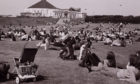 All the fashions of the 70s on display at Aberdeen Beach in 1973.