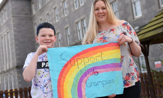 Liam Norrie with his mum Lynsey Herron


Picture by Paul Glendell