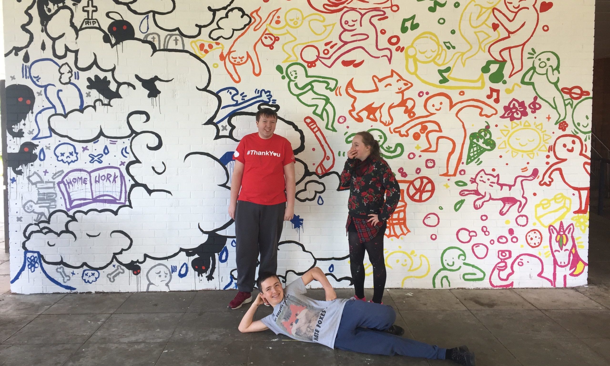 Tackling mental health: young people give back to their community. 

Jake Weston, Liam Leslie and Laura MacGillivary from Charleston Academy, Inverness in front of the mural created for mental health charity Mikeysline